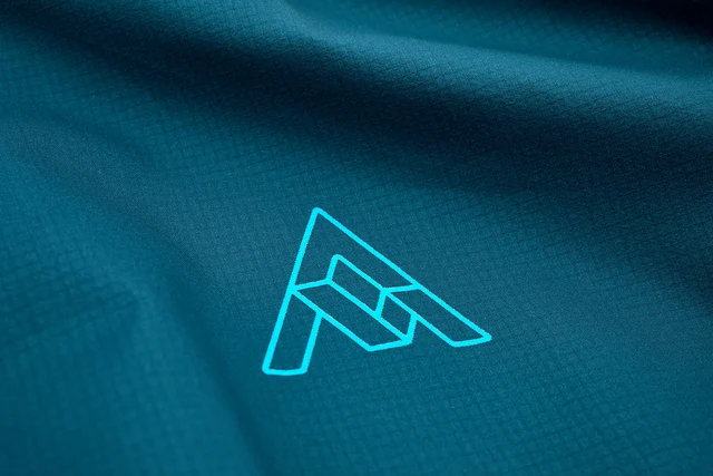 7Mesh Rebellion Dam Cykeljacka Mallard Blue, Str. L 