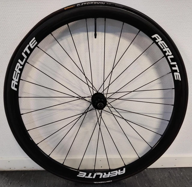Aerlite Team 38 mm DEMO Bakhjul Karbon, Pariser, HG 11s, m/dekk, 1,04 kg 