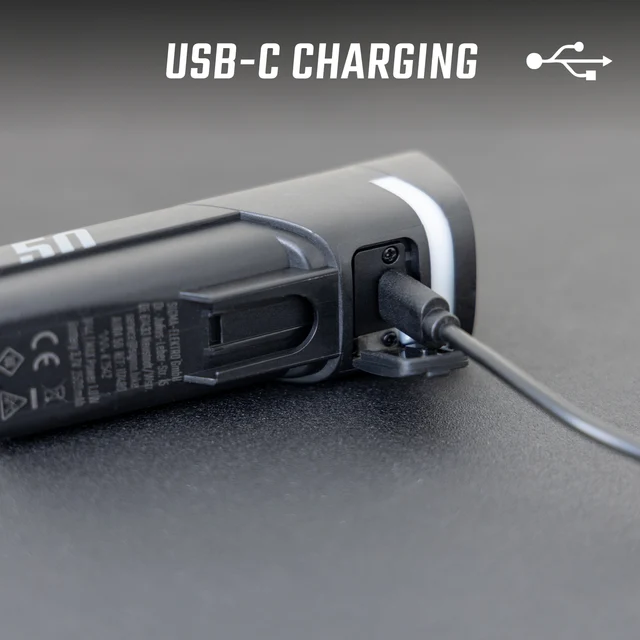Sigma Aura 50 Frontlys Sort, 160 lumens, USB-C opplading, 126g 